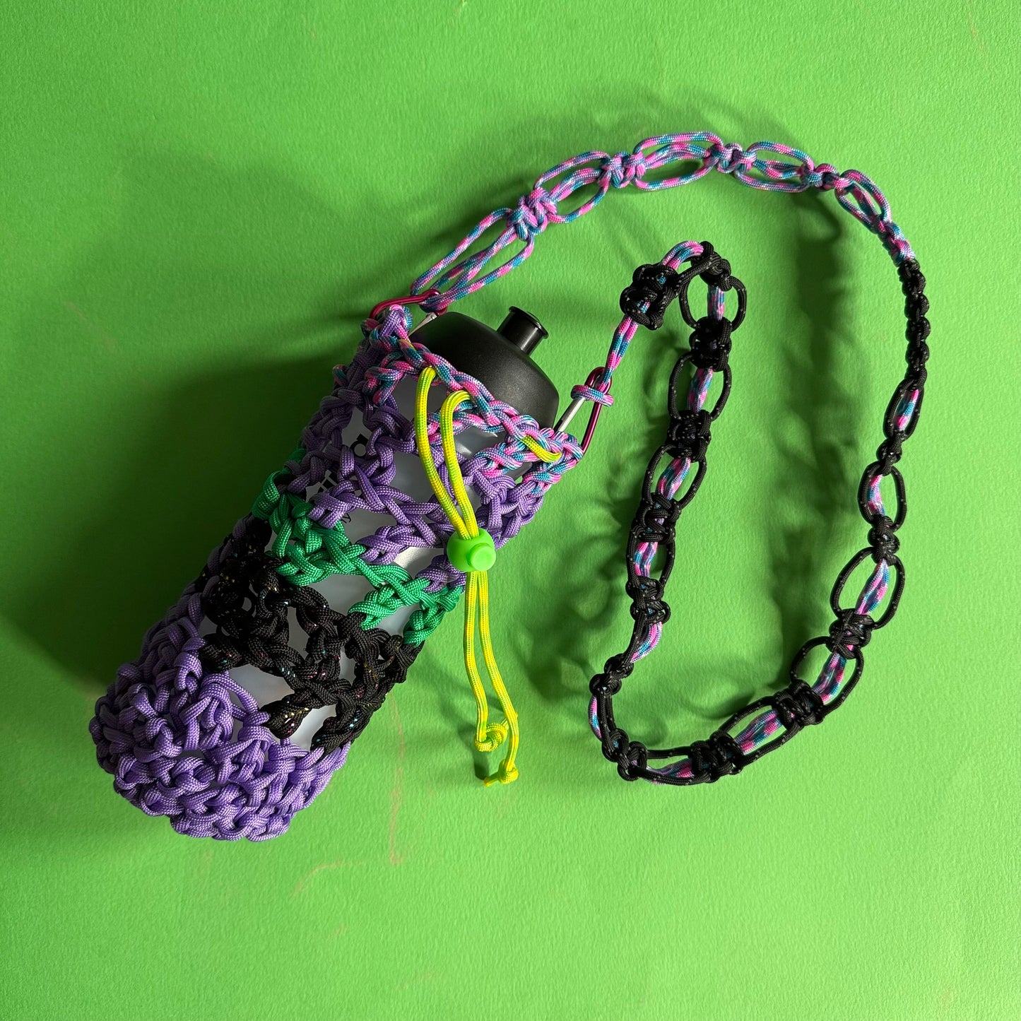 Crocheted paracord bottle bag purple multi