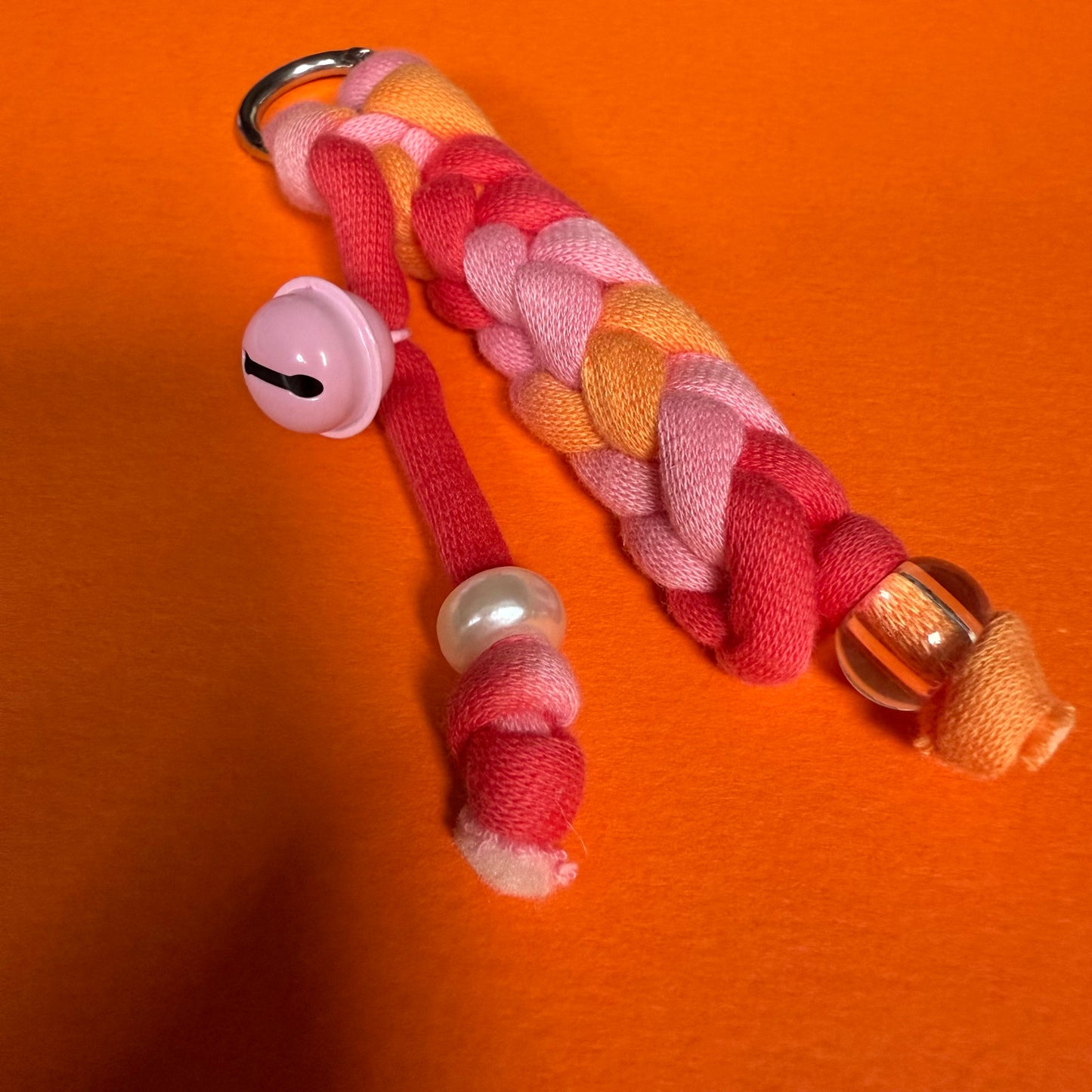 Braided jersey charm