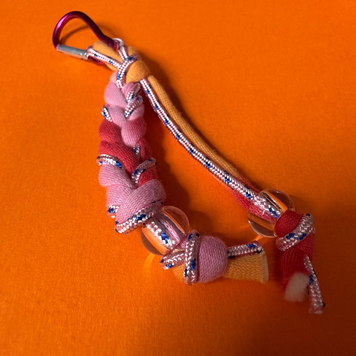 Braided jersey charm