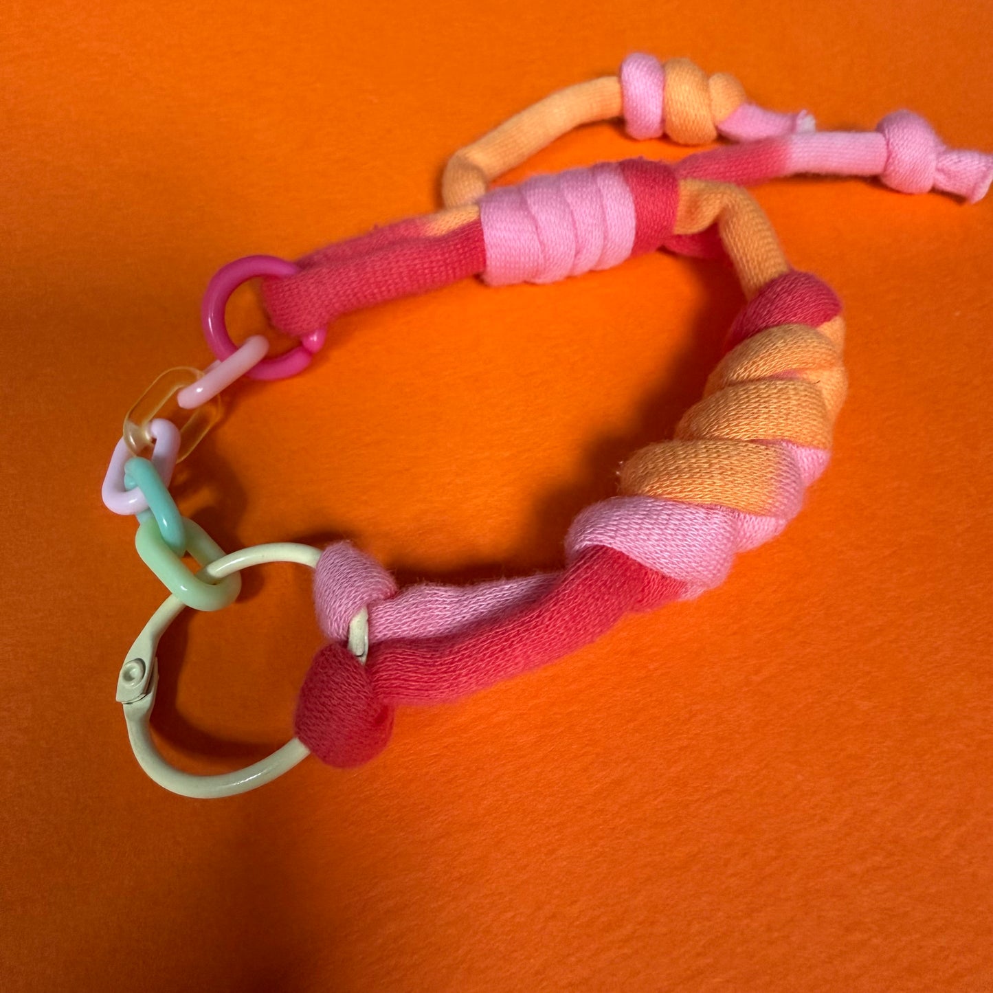 Braided jersey charm