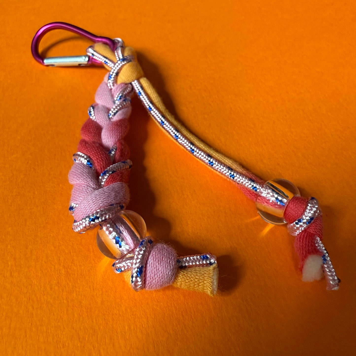 Braided jersey charm
