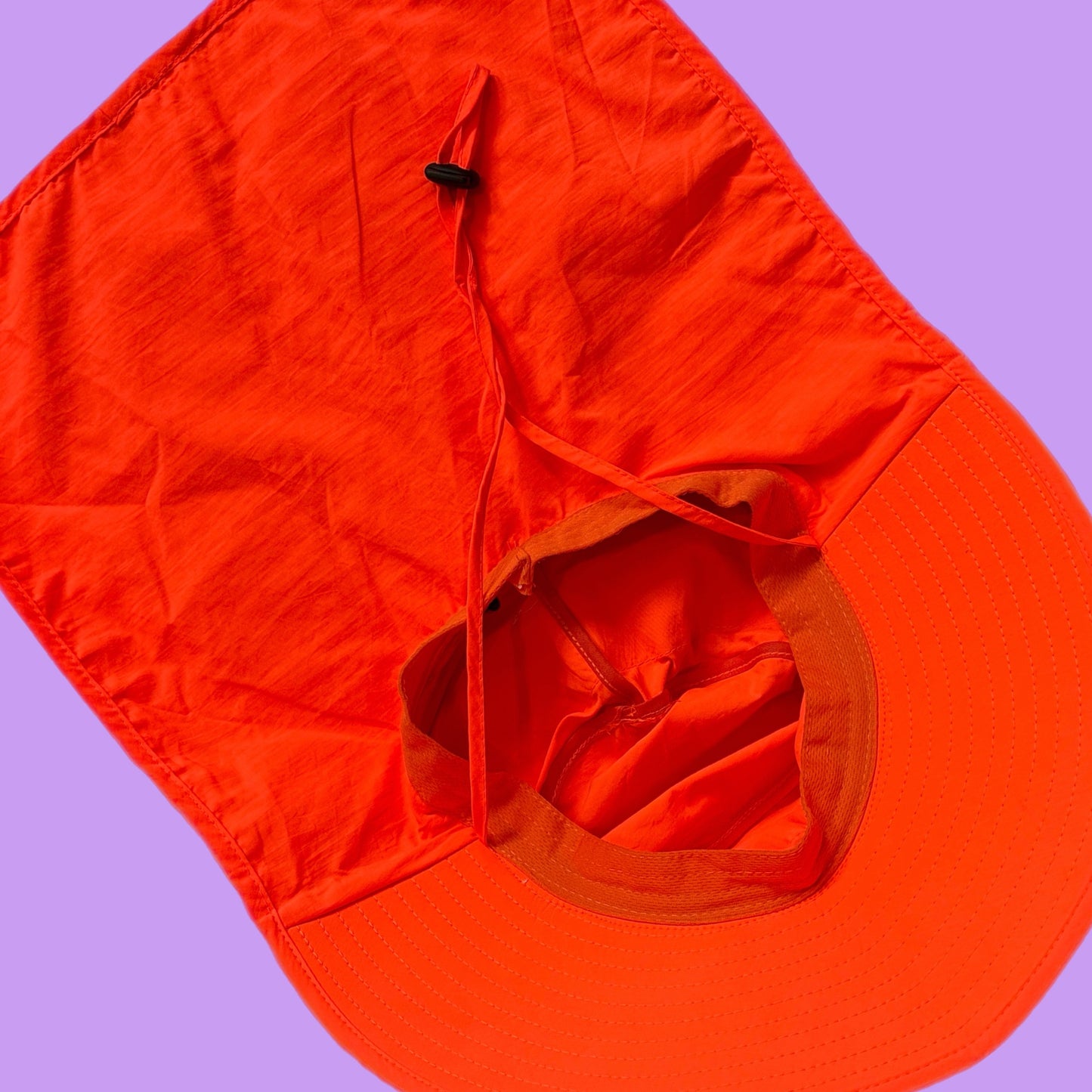 Neon orange rain and sun hat