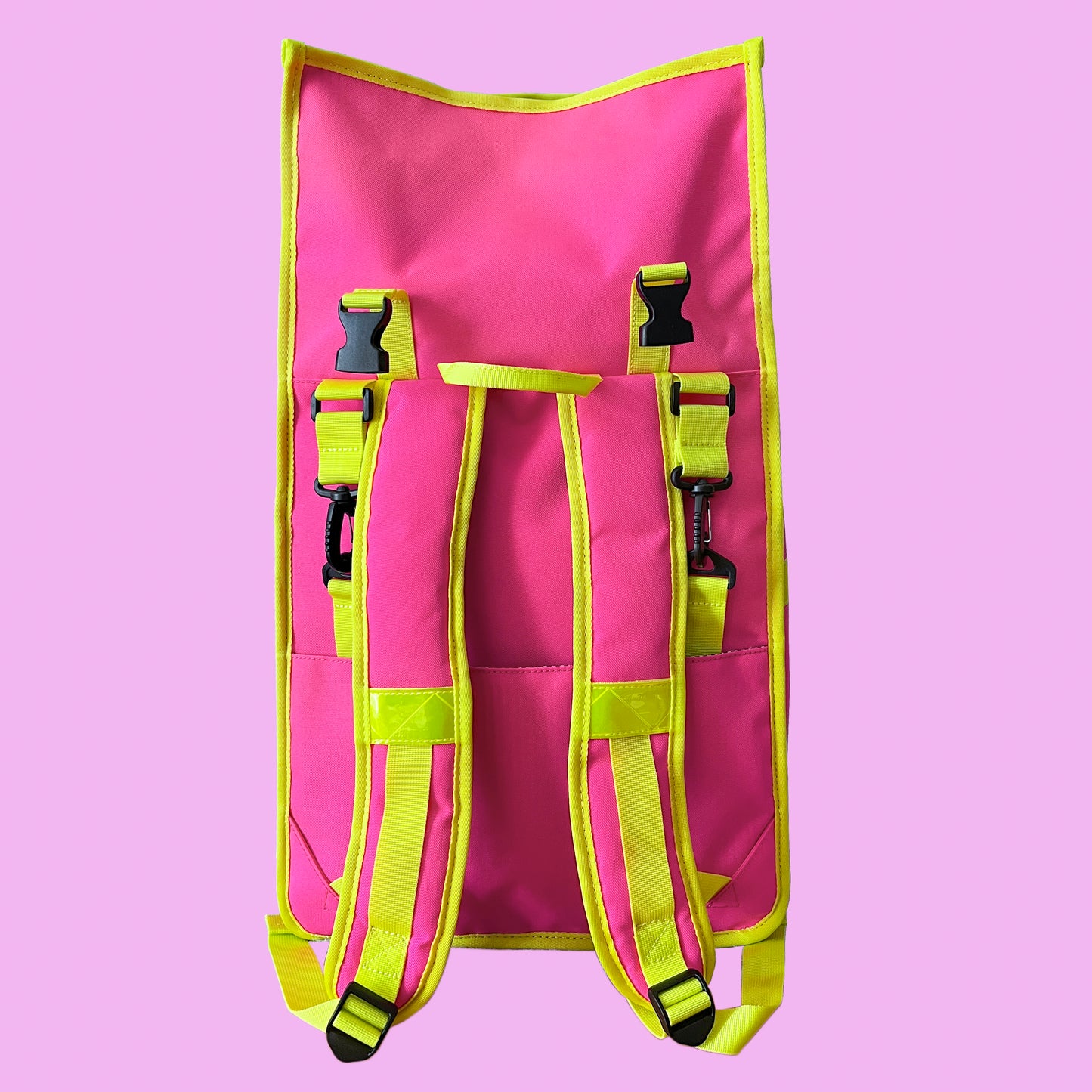 Neon pink roll top backpack