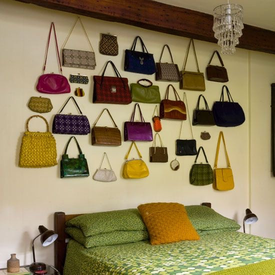 bag display on a wall in a bedroom