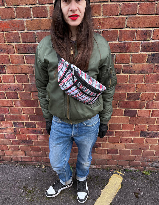 woman wearing bum bag across front of chest