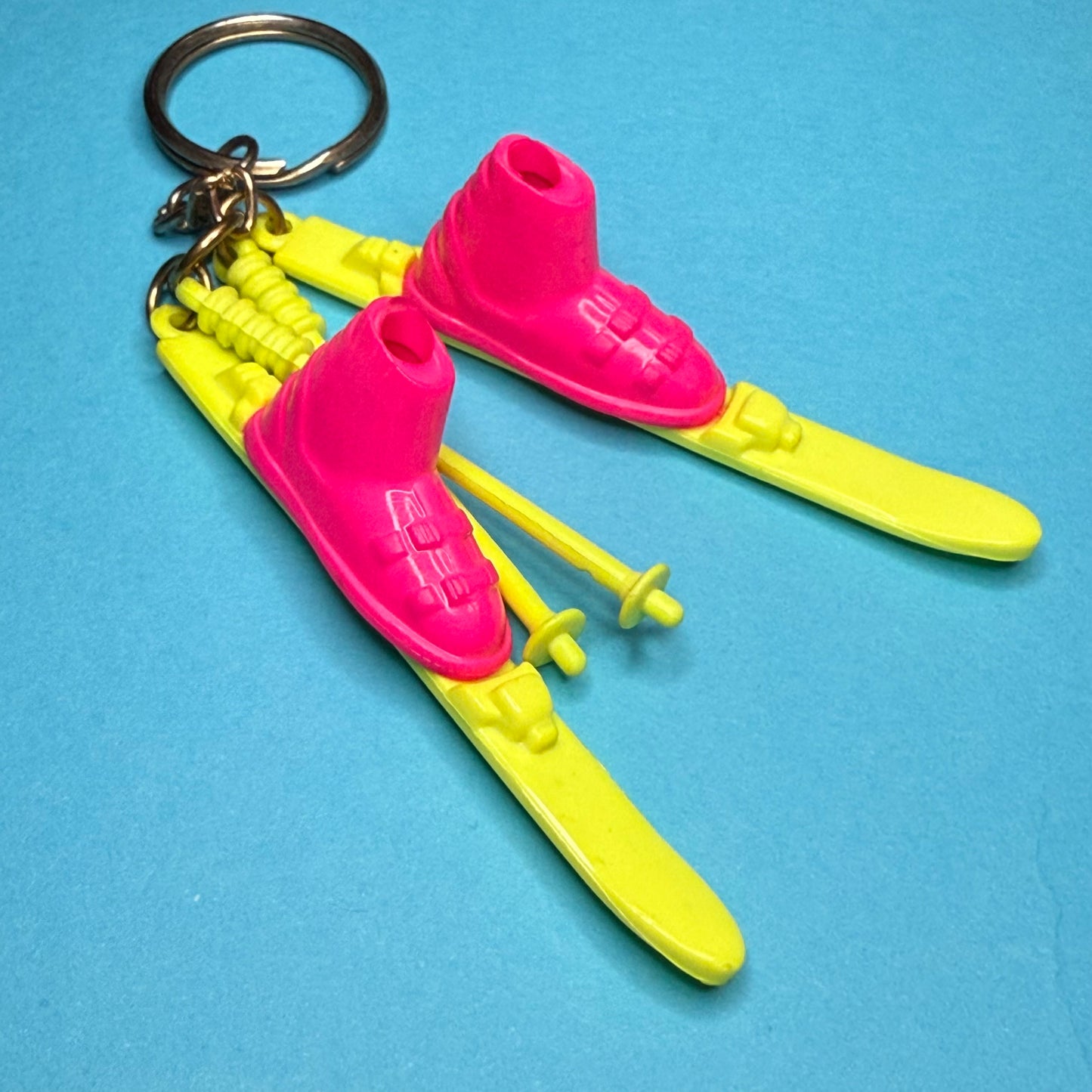 Neon 80s mini ski and poles charm keyring