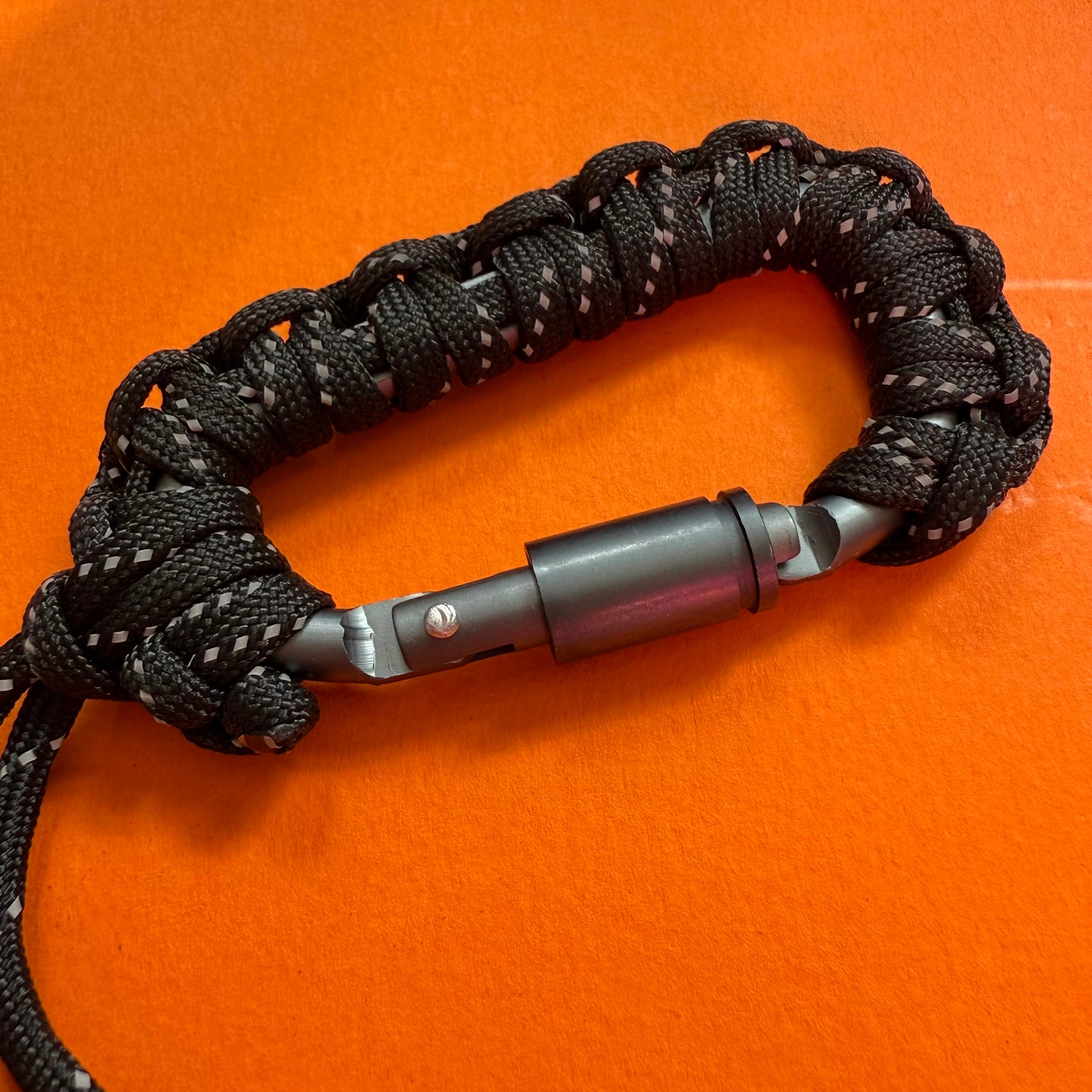 Paracord wrapped carabiner black reflective