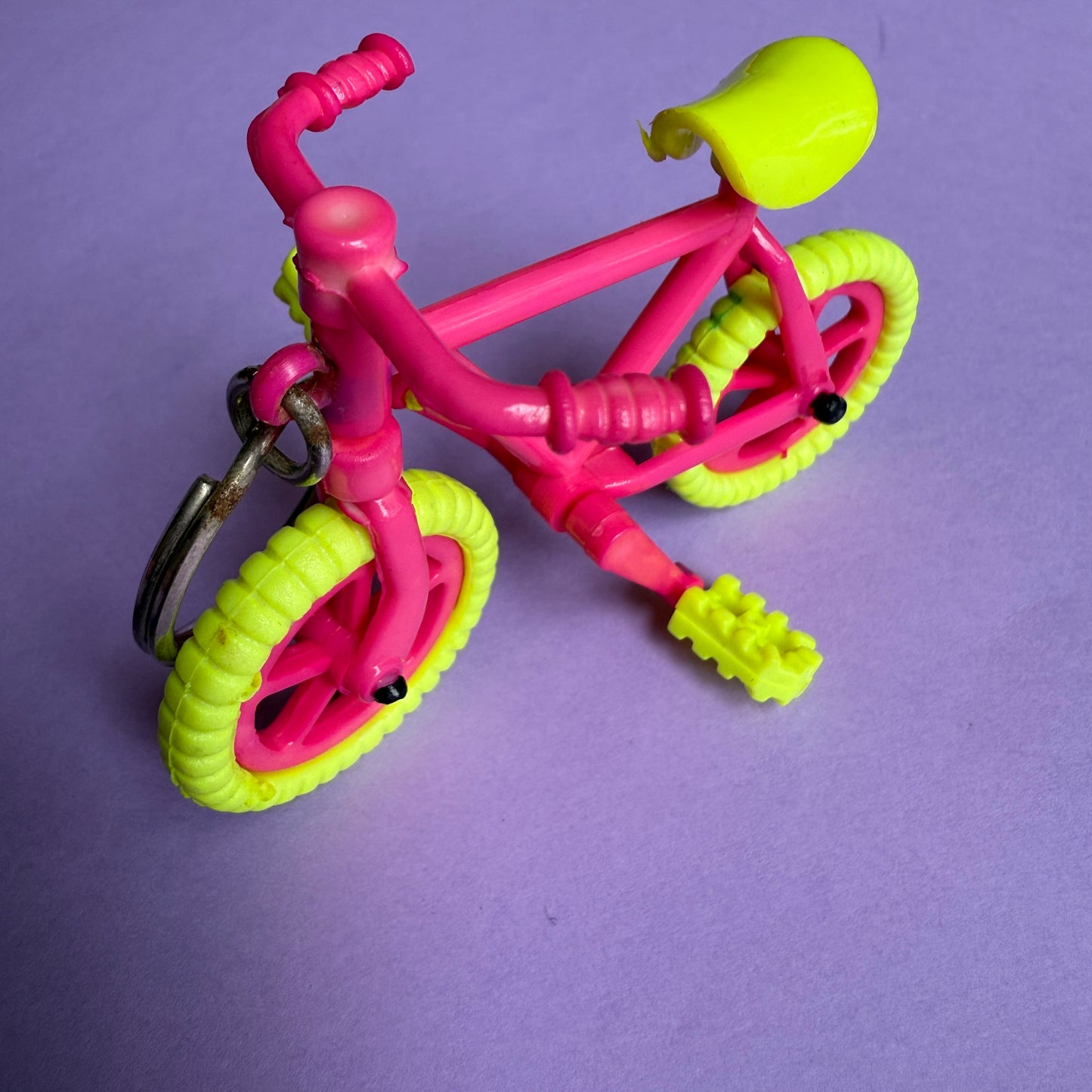 Neon 80s pink bicycle charm