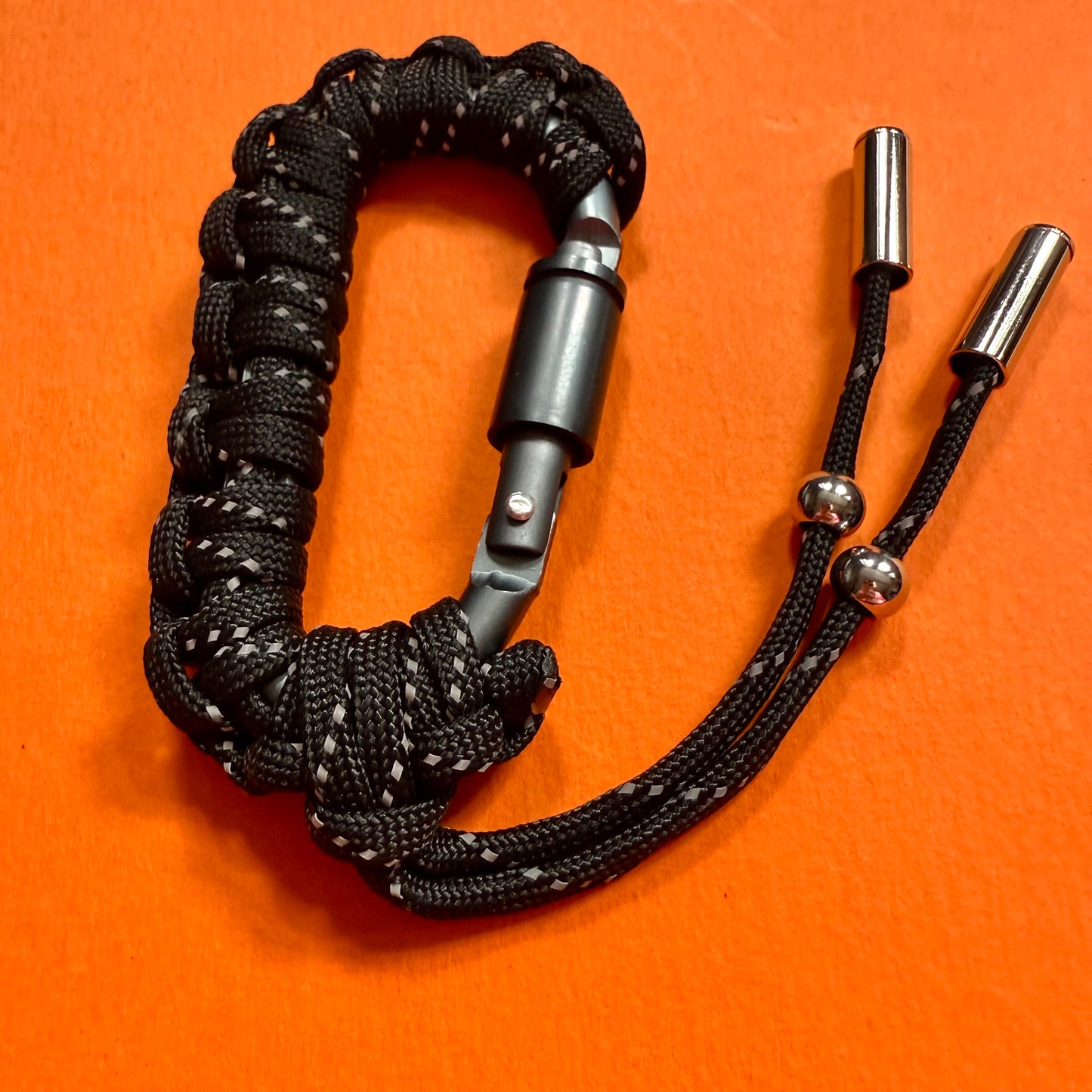 Paracord wrapped carabiner black reflective
