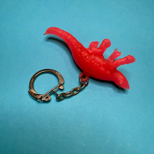 Neon 80s mini dinosaur charm keyring