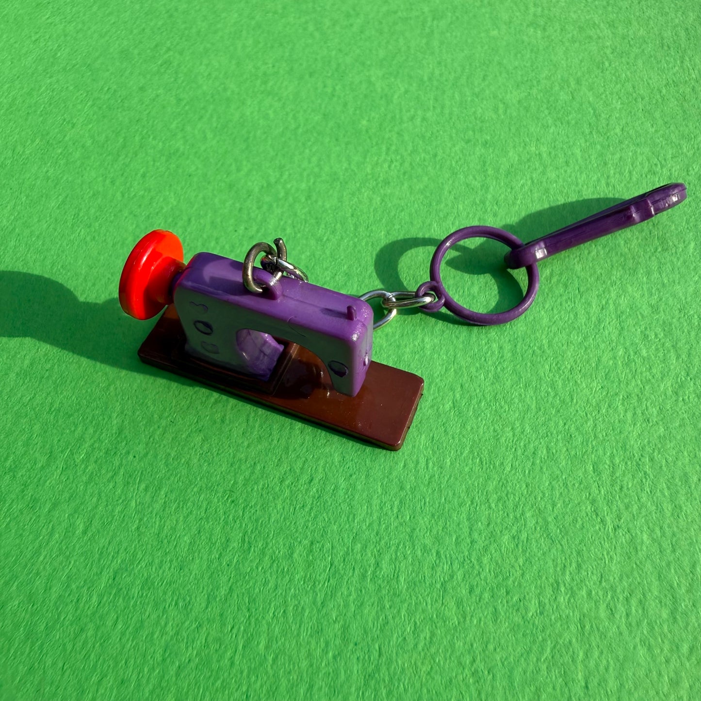 Neon 80s keyring charm sewing machine