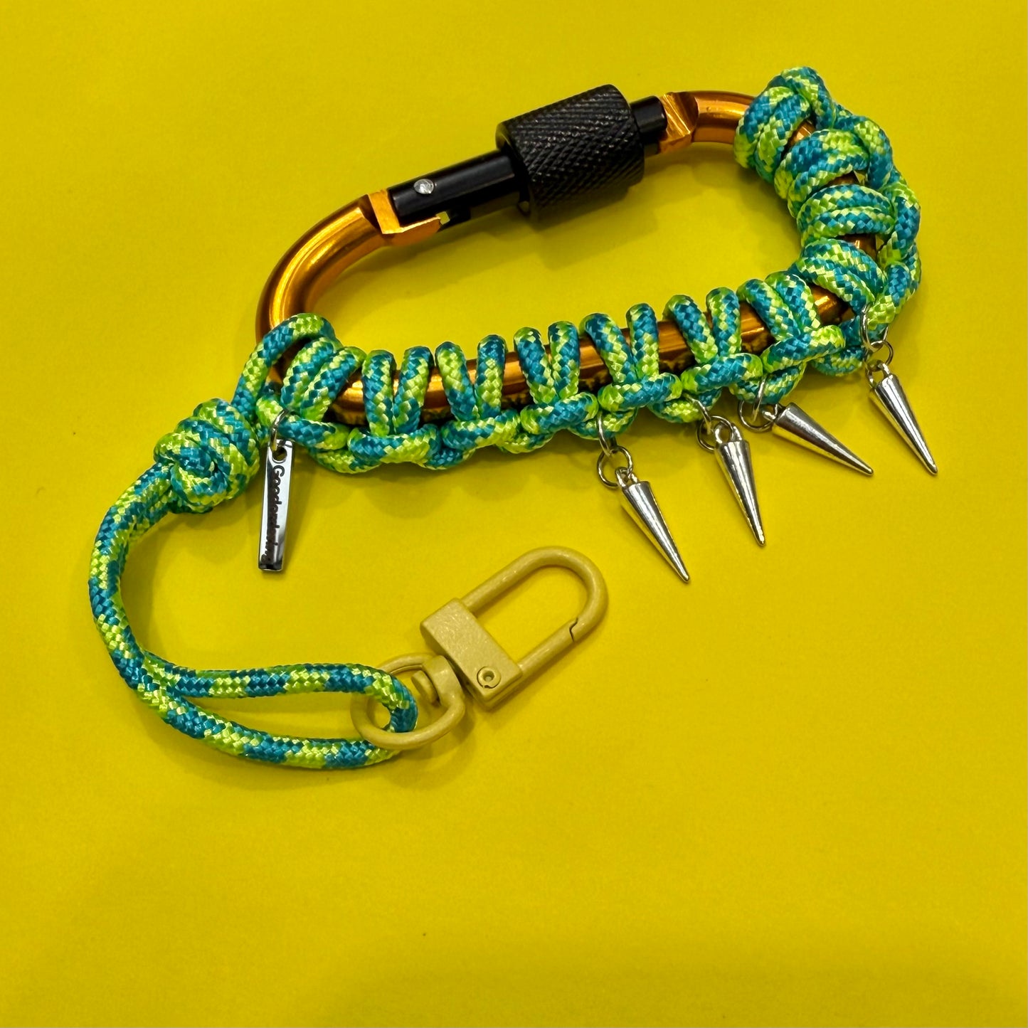 Paracord wrapped carabiner green spikes