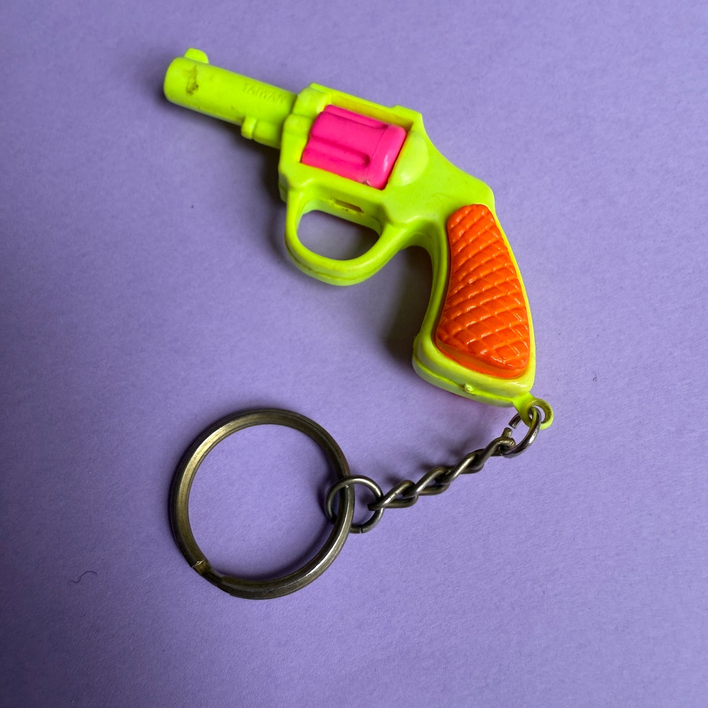 Neon 80s plastic gun charm