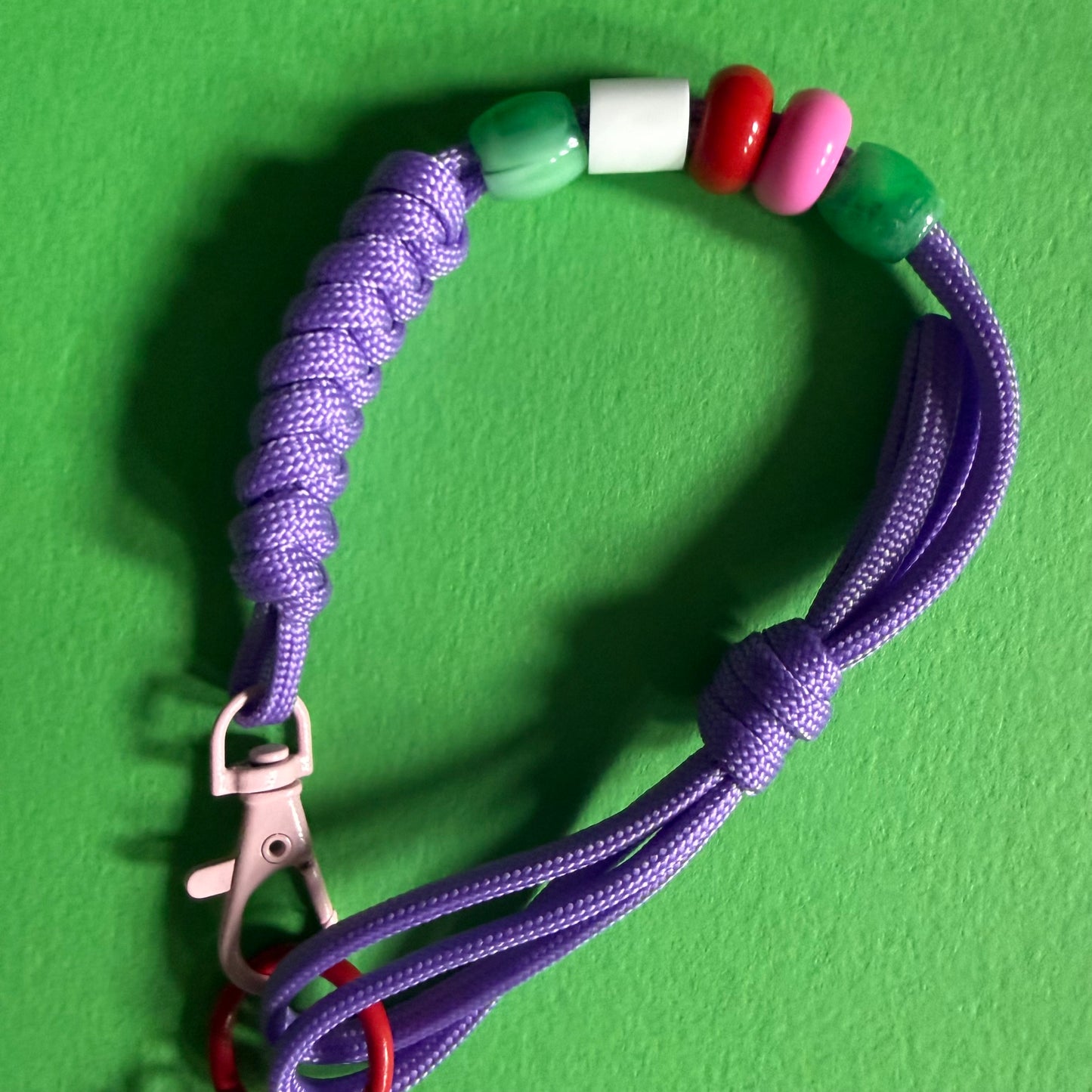 Phone wrist strap with fidget beads