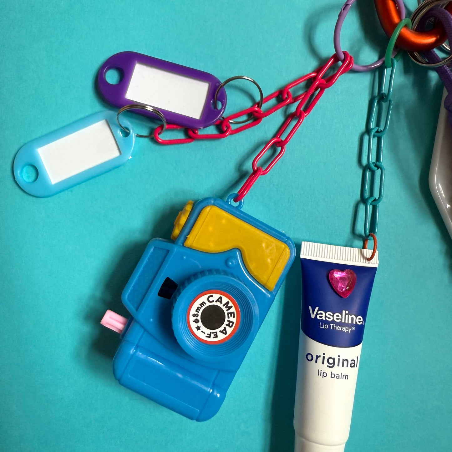 Bag charm and keyring camera vaseline