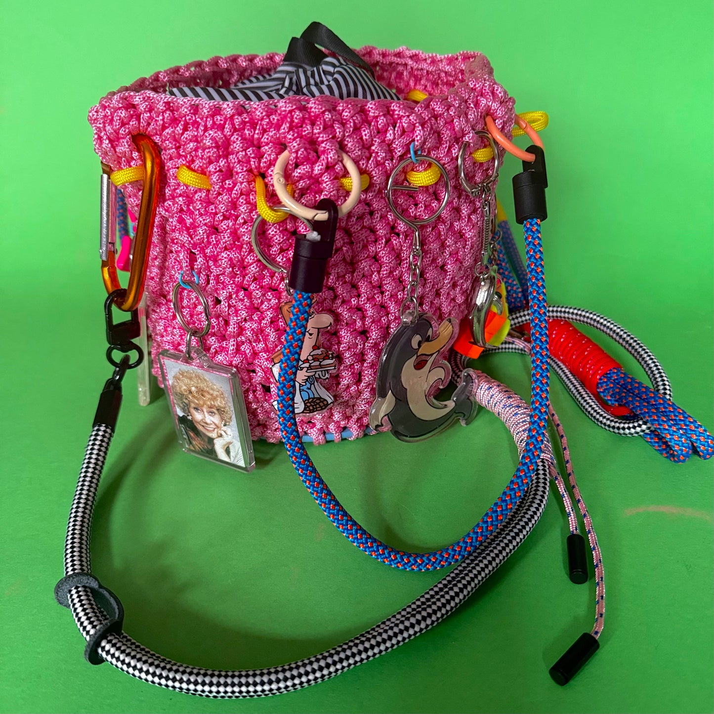 Crocheted bucket bag with keyring charms