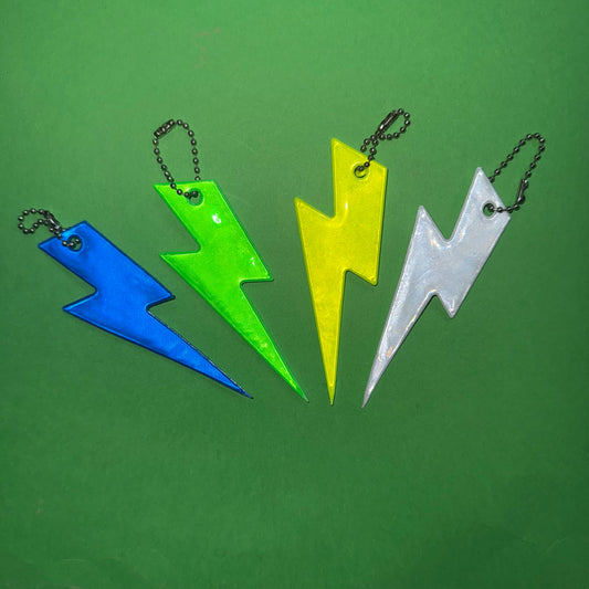 Neon bolt light reflector charm