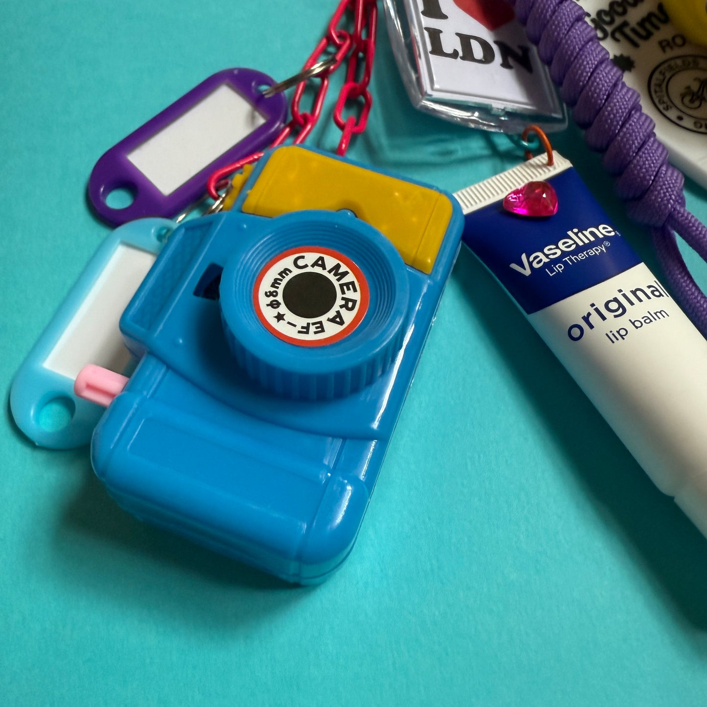 Bag charm and keyring camera vaseline