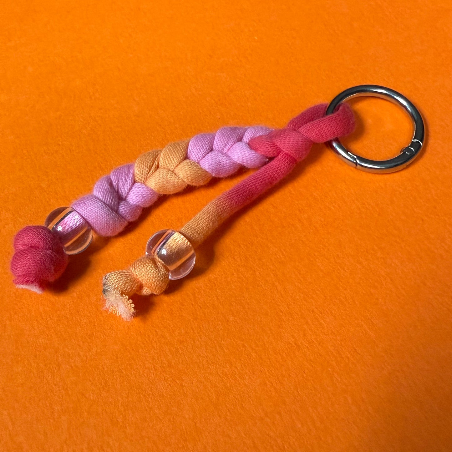 Braided jersey charm