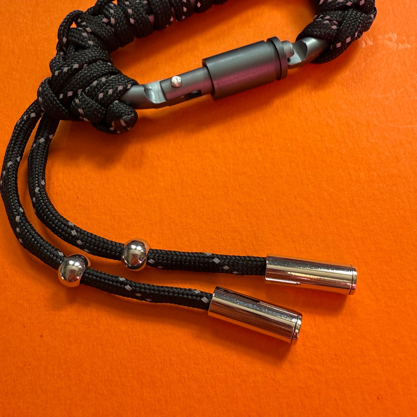 Paracord wrapped carabiner black reflective