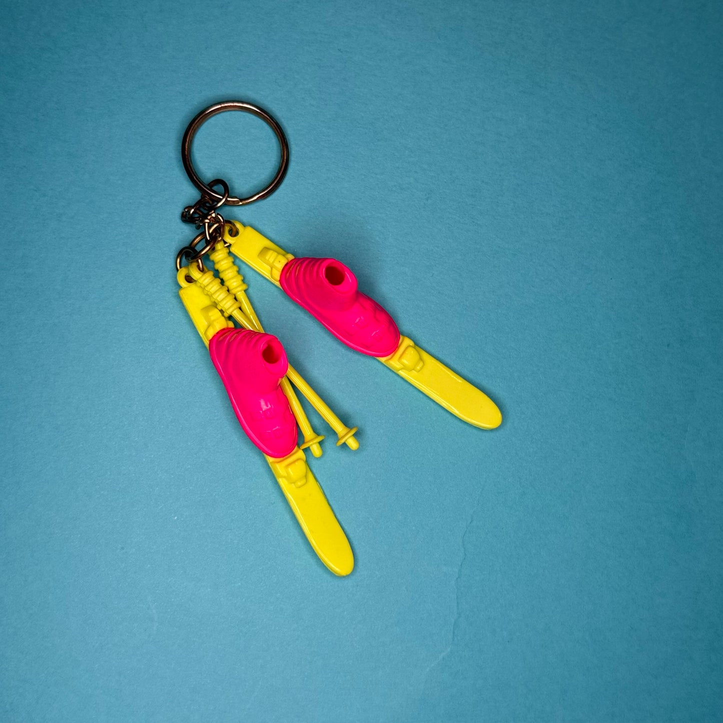 Neon 80s mini ski and poles charm keyring