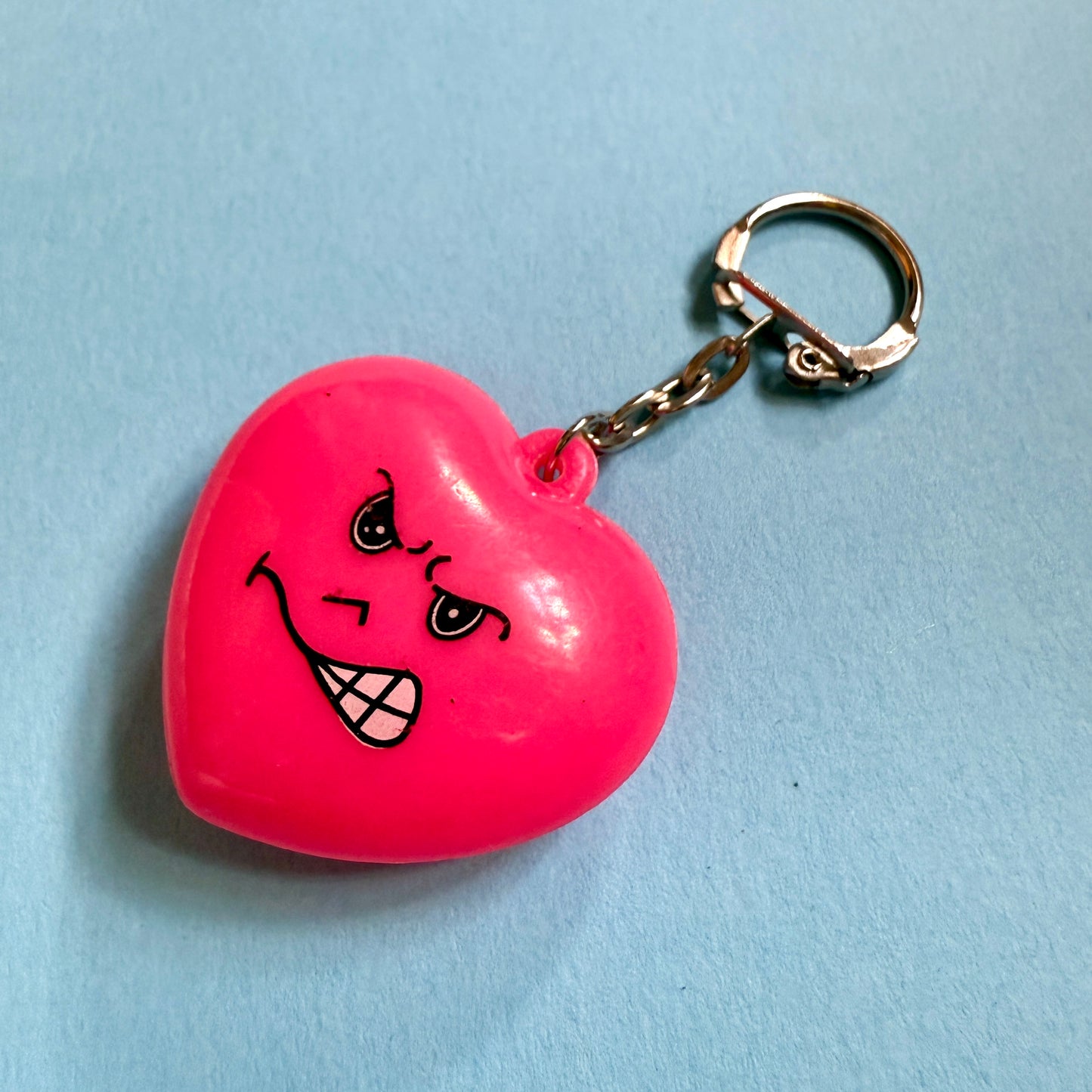 Neon 80s mini pink grumpy heart charm