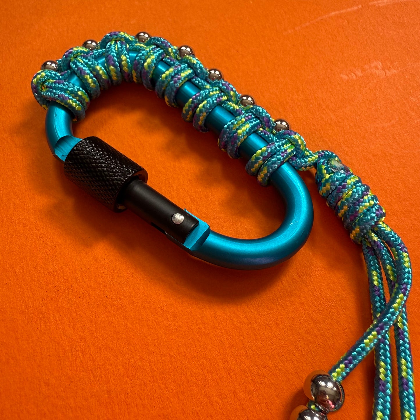 Paracord wrapped carabiner aqua beaded