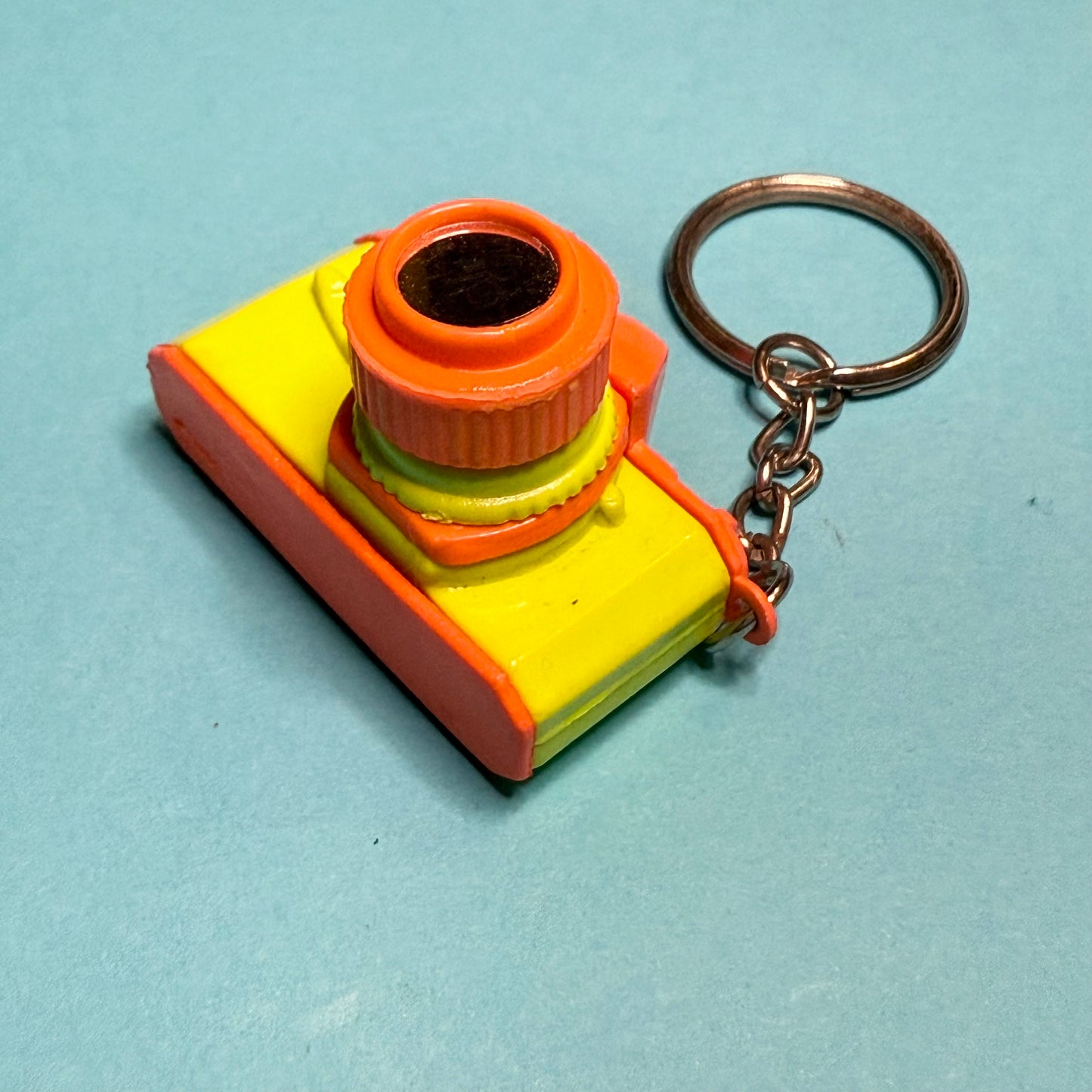 Neon 80s mini orange yellow camera charm keyring