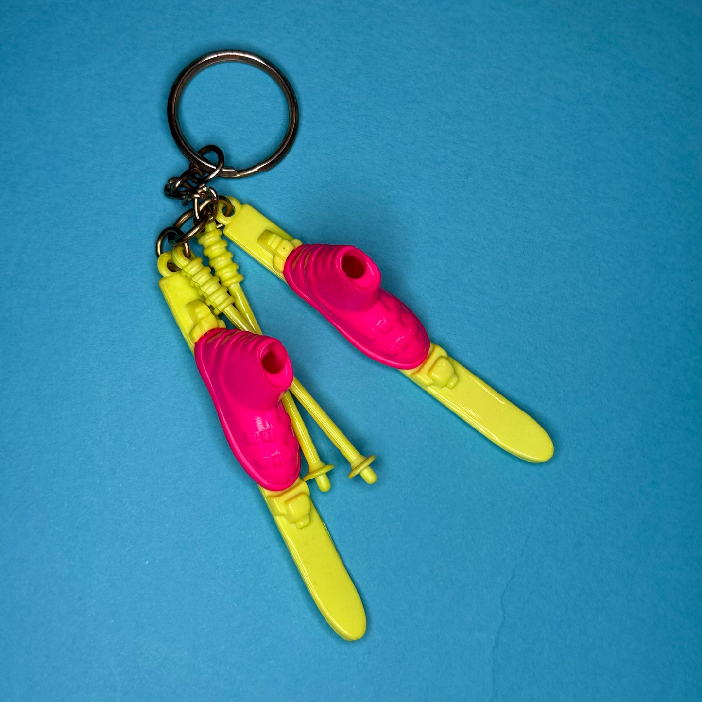 Neon 80s mini ski and poles charm keyring