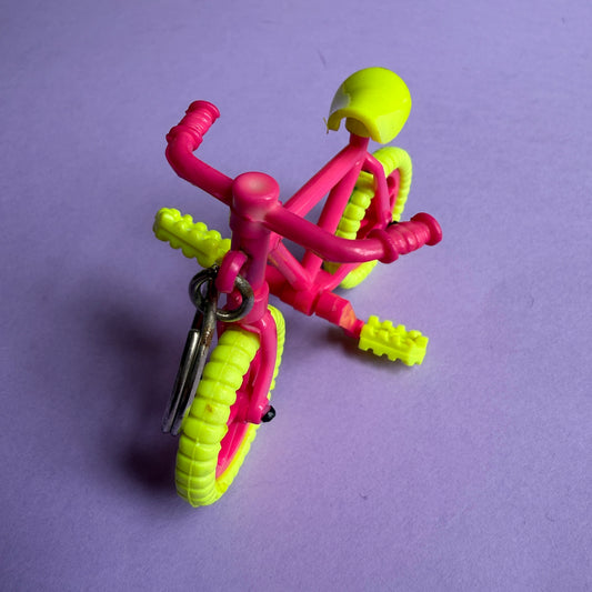 Neon 80s pink bicycle charm