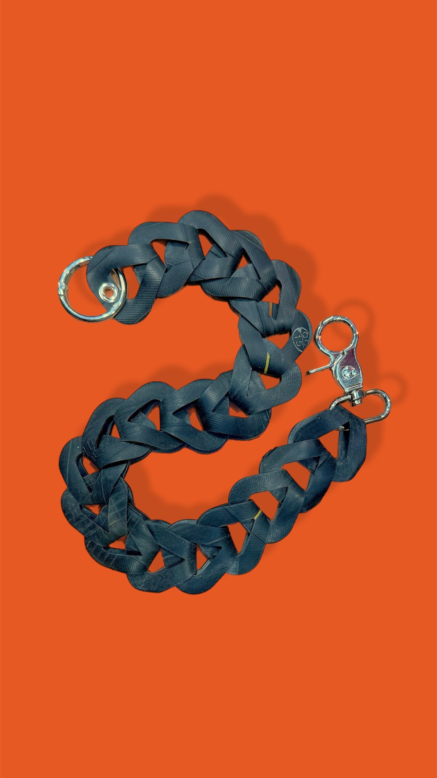 Upcycled inner tube pocket strap