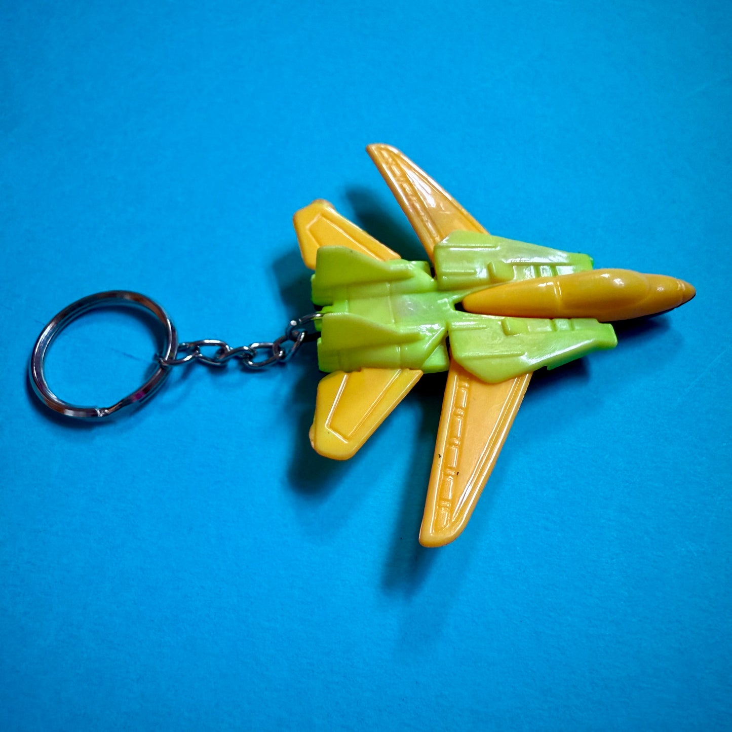 Neon 80s vintage jet plane charm