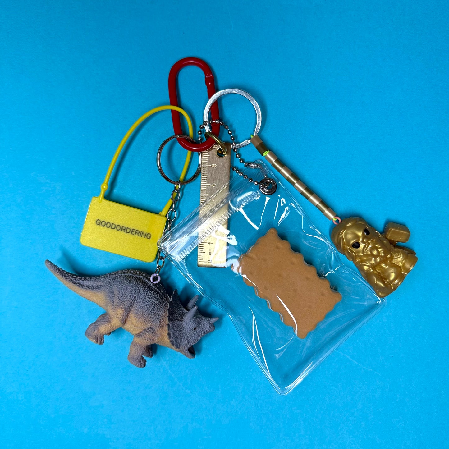 Bag charm and keyring gold ruler dinosaur