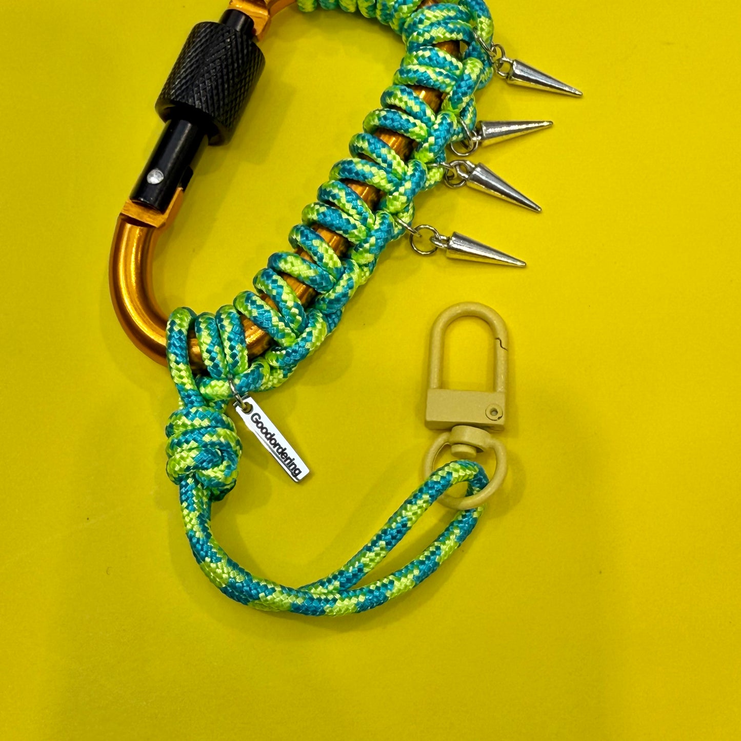 Paracord wrapped carabiner green spikes