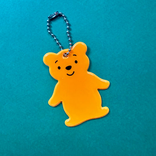 Neon orange teddy bear light reflector charm
