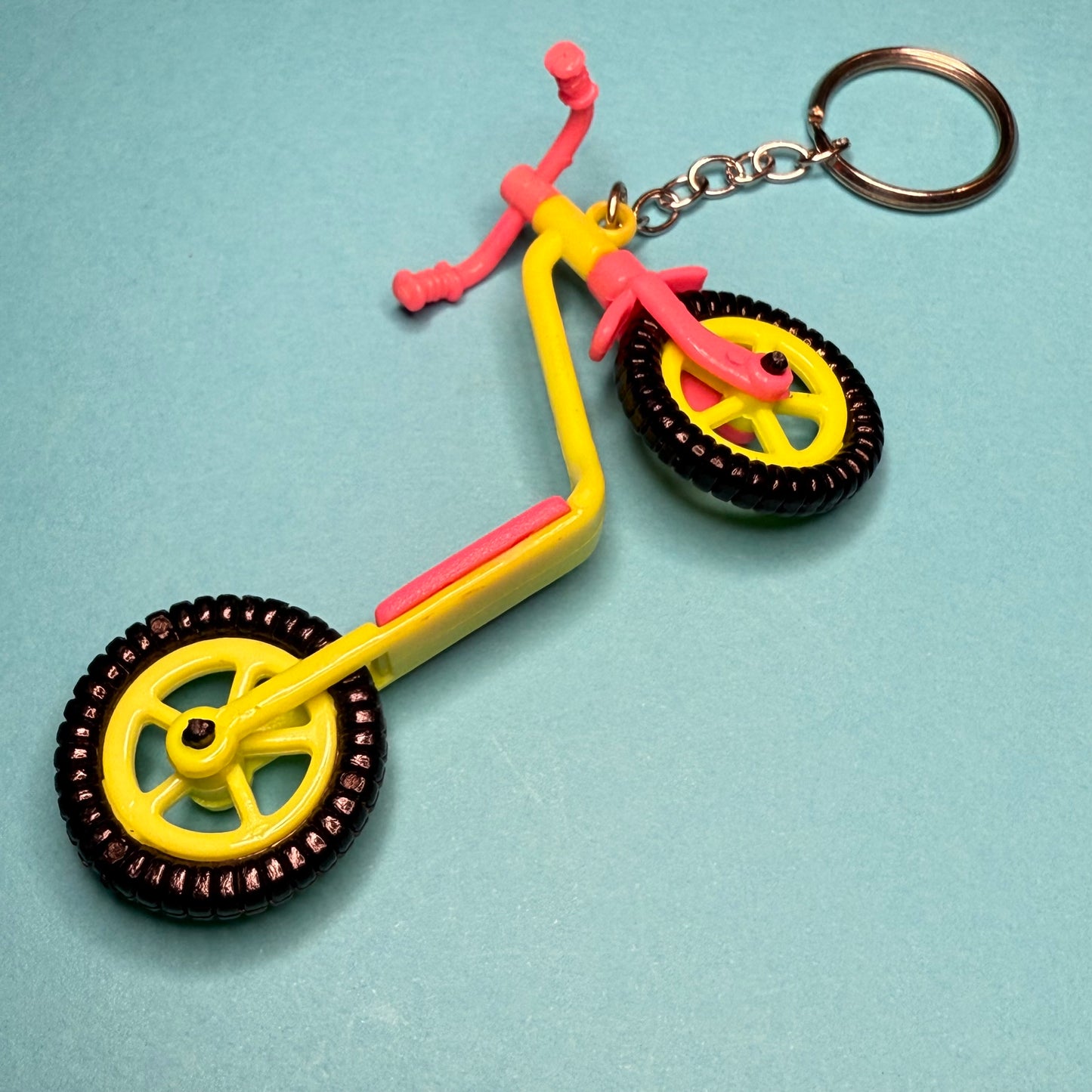 Neon retro 80s keyring scooter