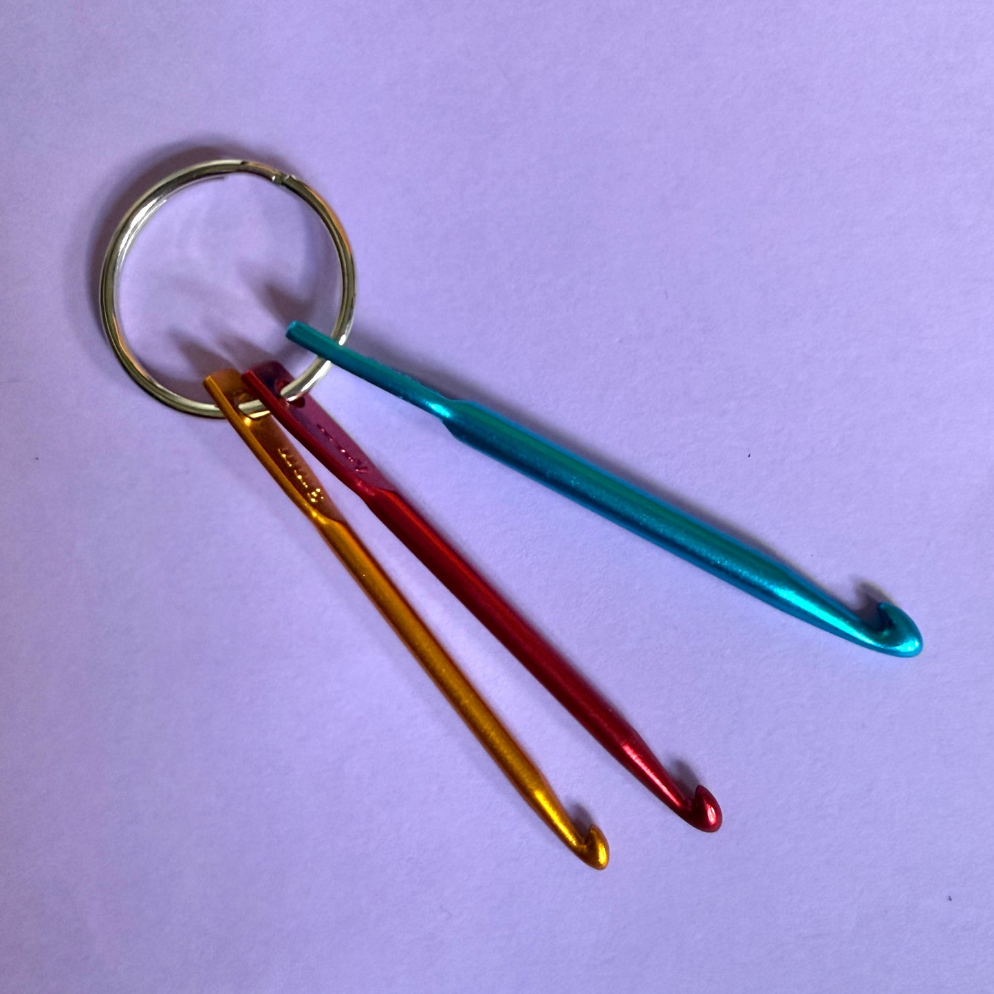 Mini crochet hooks charm