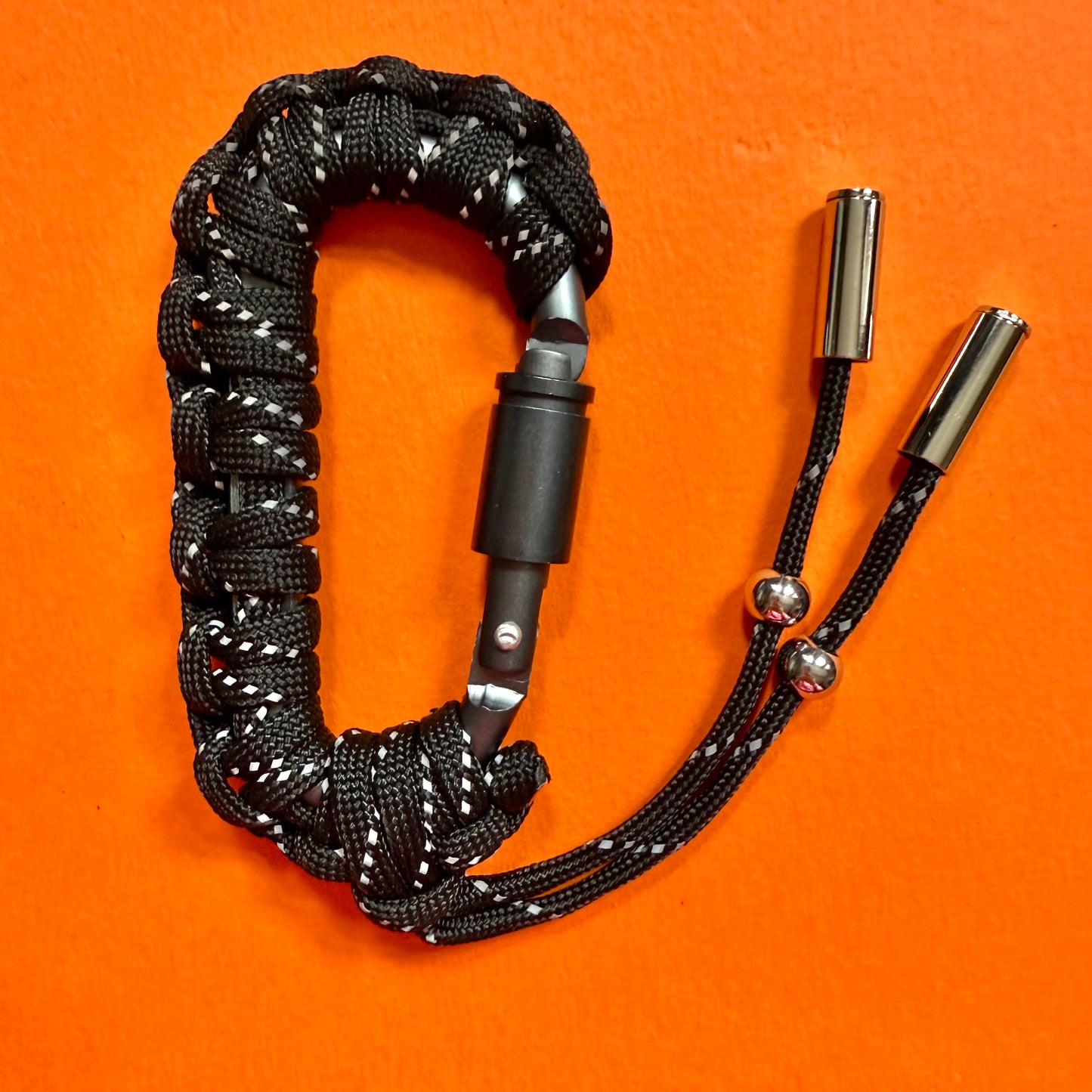 Paracord wrapped carabiner black reflective
