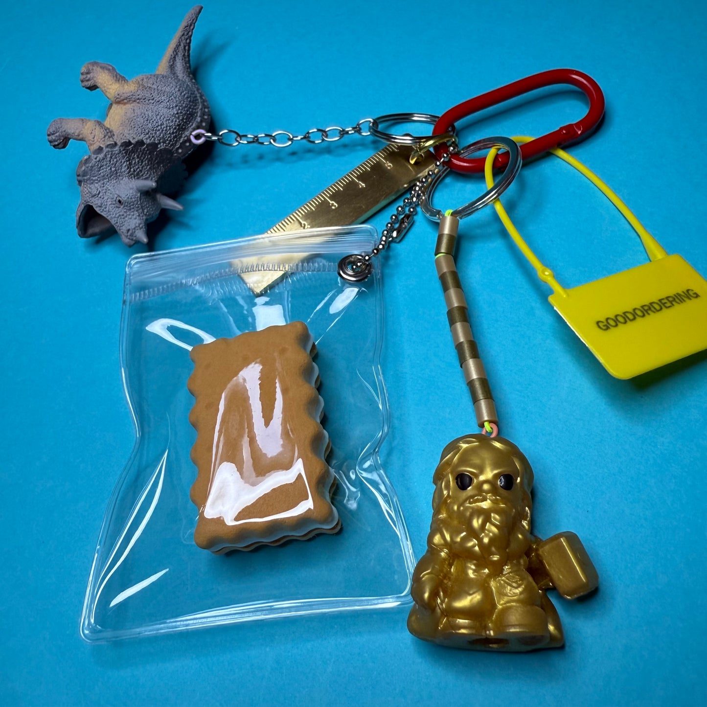 Bag charm and keyring gold ruler dinosaur