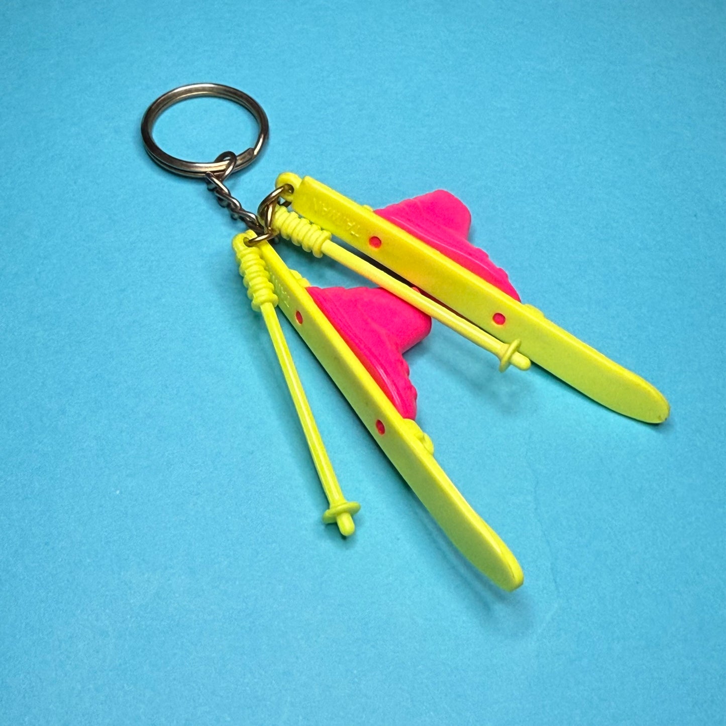 Neon 80s mini ski and poles charm keyring