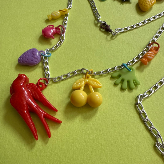 Vintage plastic charm necklace Swallow