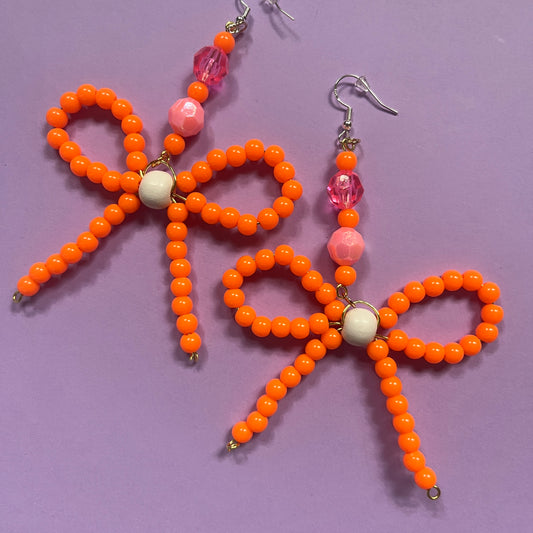 Orange bow earrings