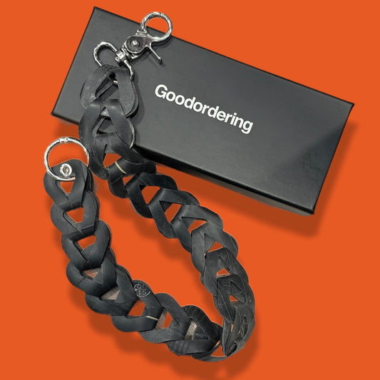 Upcycled inner tube pocket strap