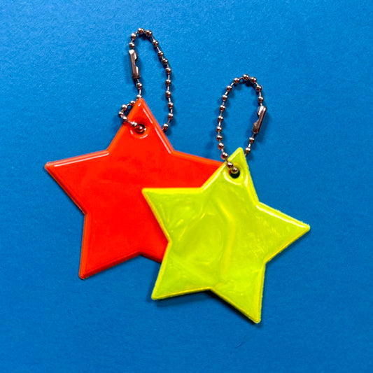 Neon star light reflector charm