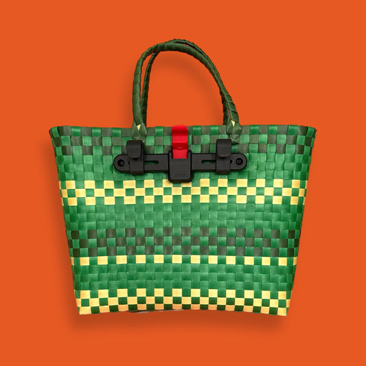 Green woven bicycle basket made from upcycled plastic