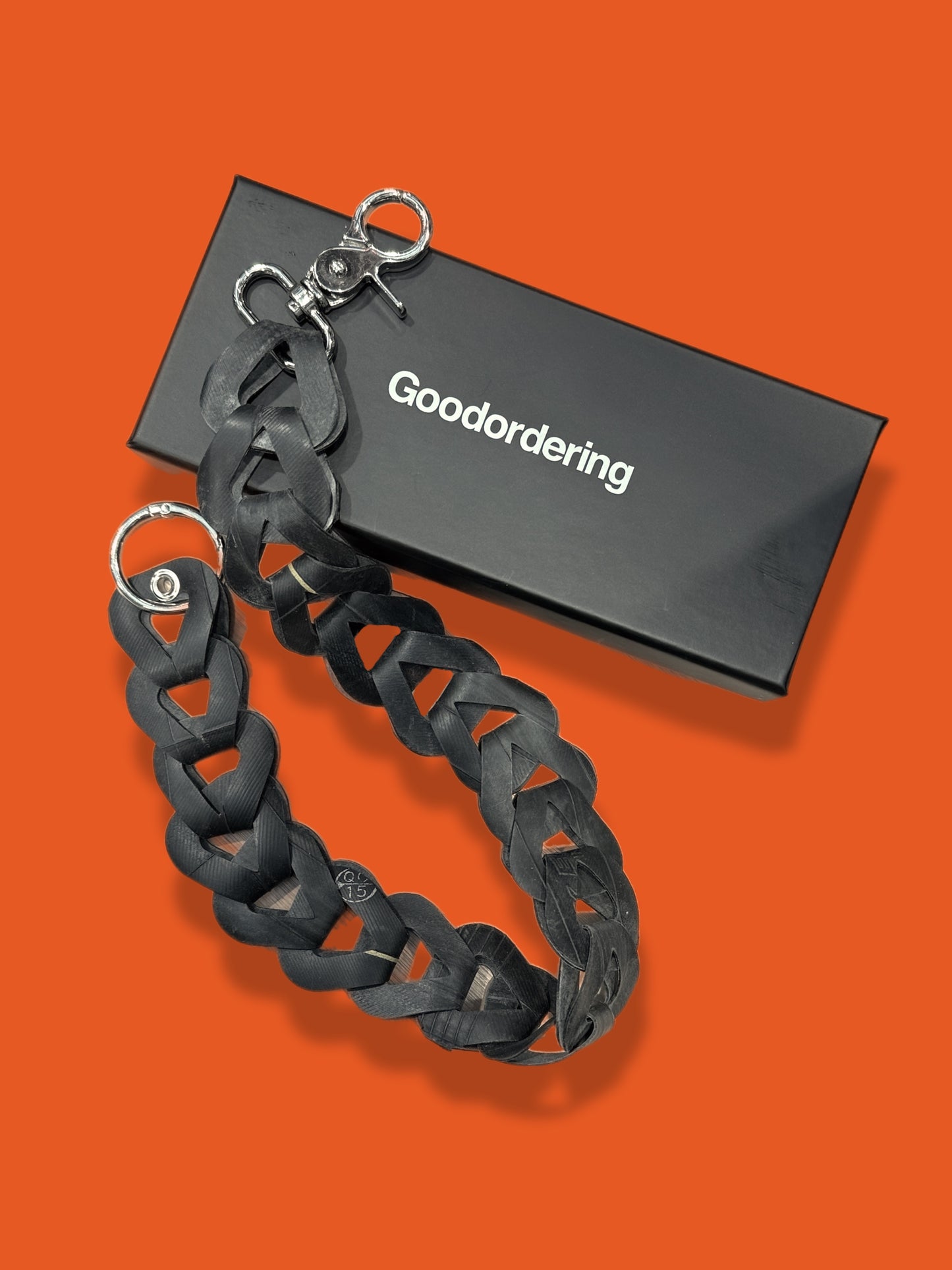 Upcycled inner tube pocket strap