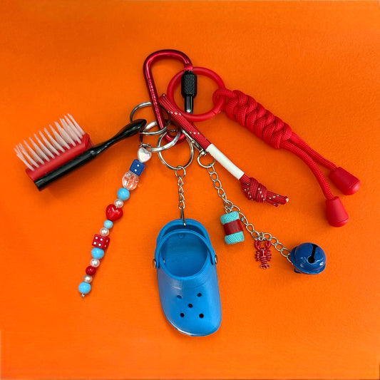 Bag charm and keyring hair brush