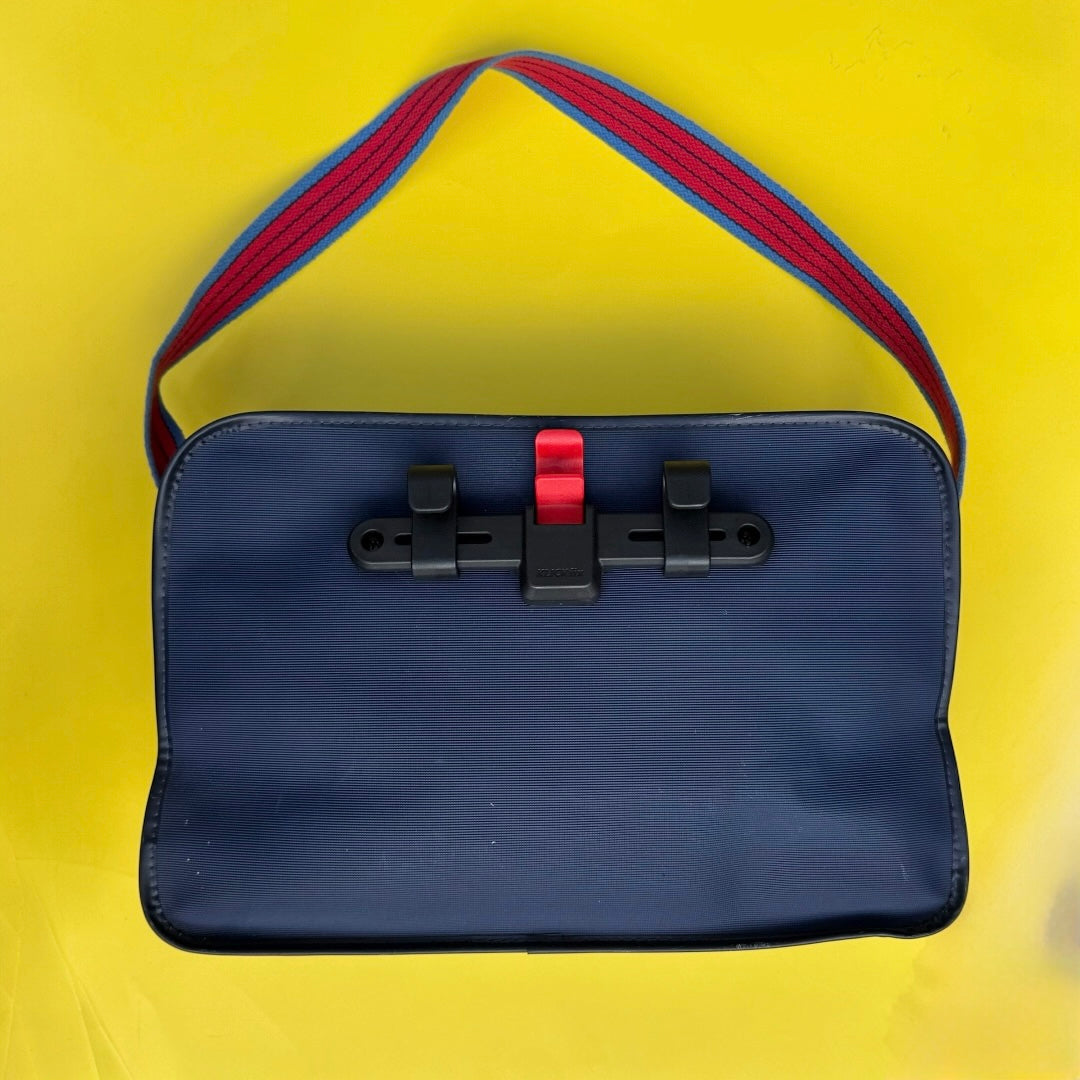 Upcycled adidas vintage sports bag converted into a bike pannier
