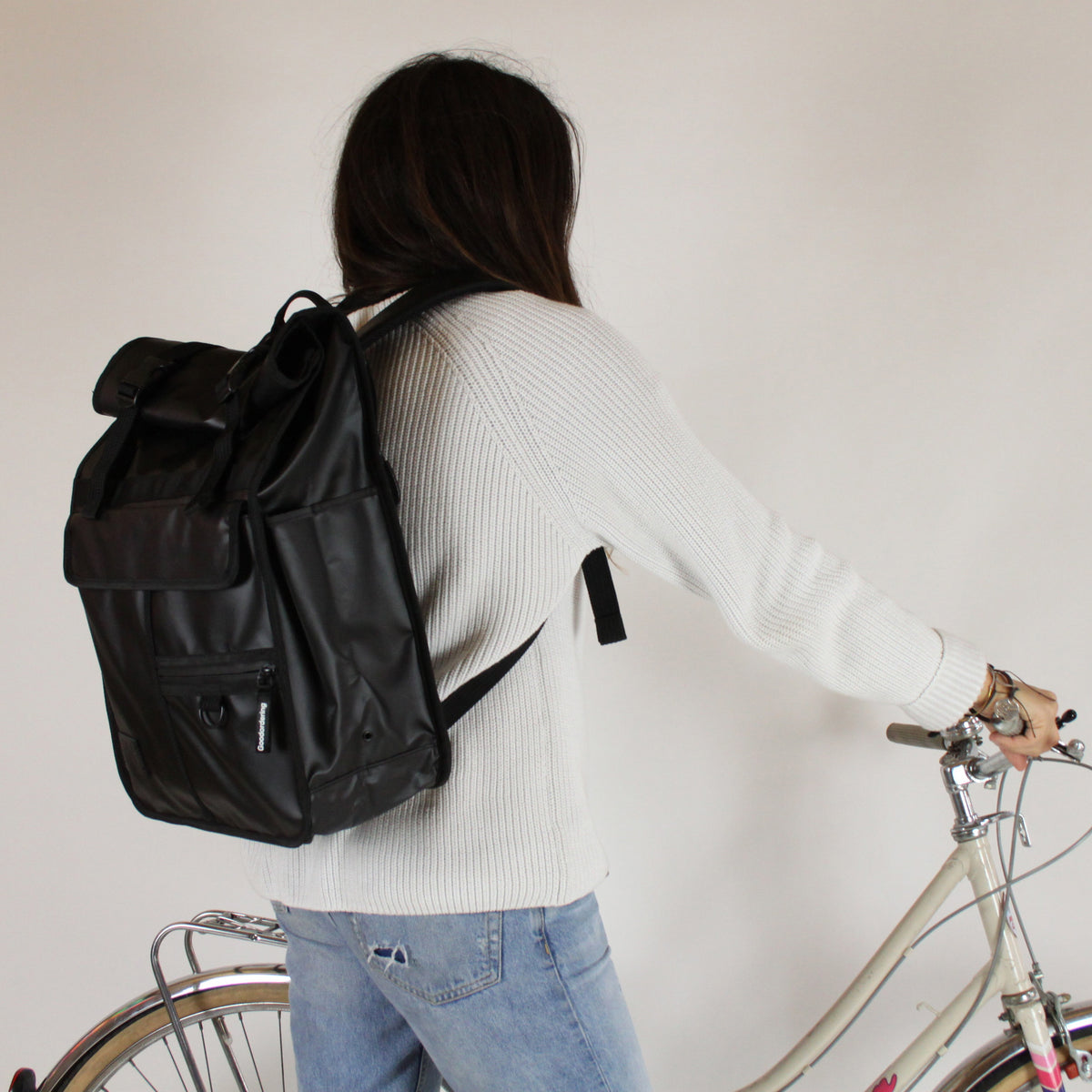 Matt Black rolltop backpack Goodordering Black ECO rolltop backpack pannier worn as a commuter backpack